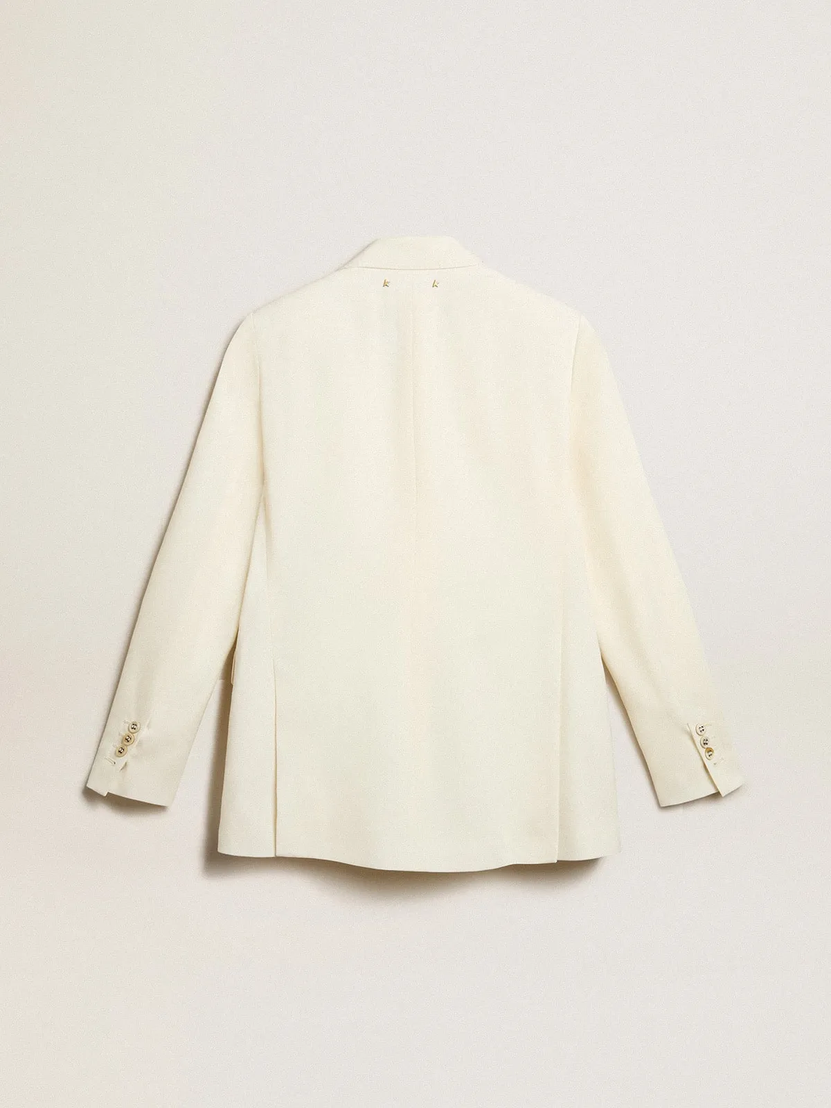 Women’s aged white double-breasted blazer